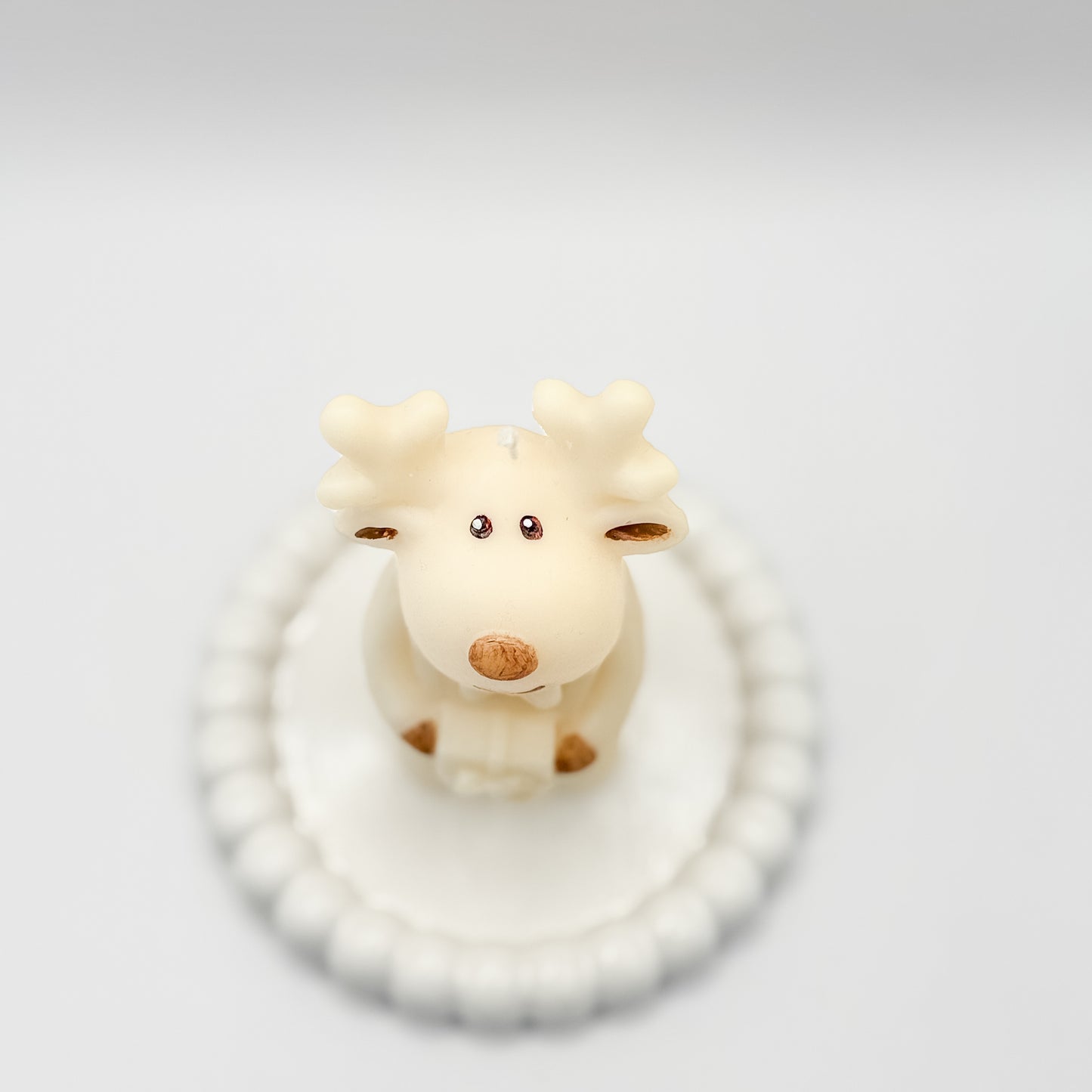 Reno con regalo Vela